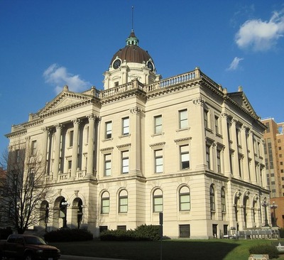 Side part view of the McLean County Museum of History / Wikipedia / Michael from Palatine, Illinois 

Link: https://en.wikipedia.org/wiki/McLean_County_Museum_of_History#/media/File:McLean_County_Courthouse_and_Square_(7436726814).jpg